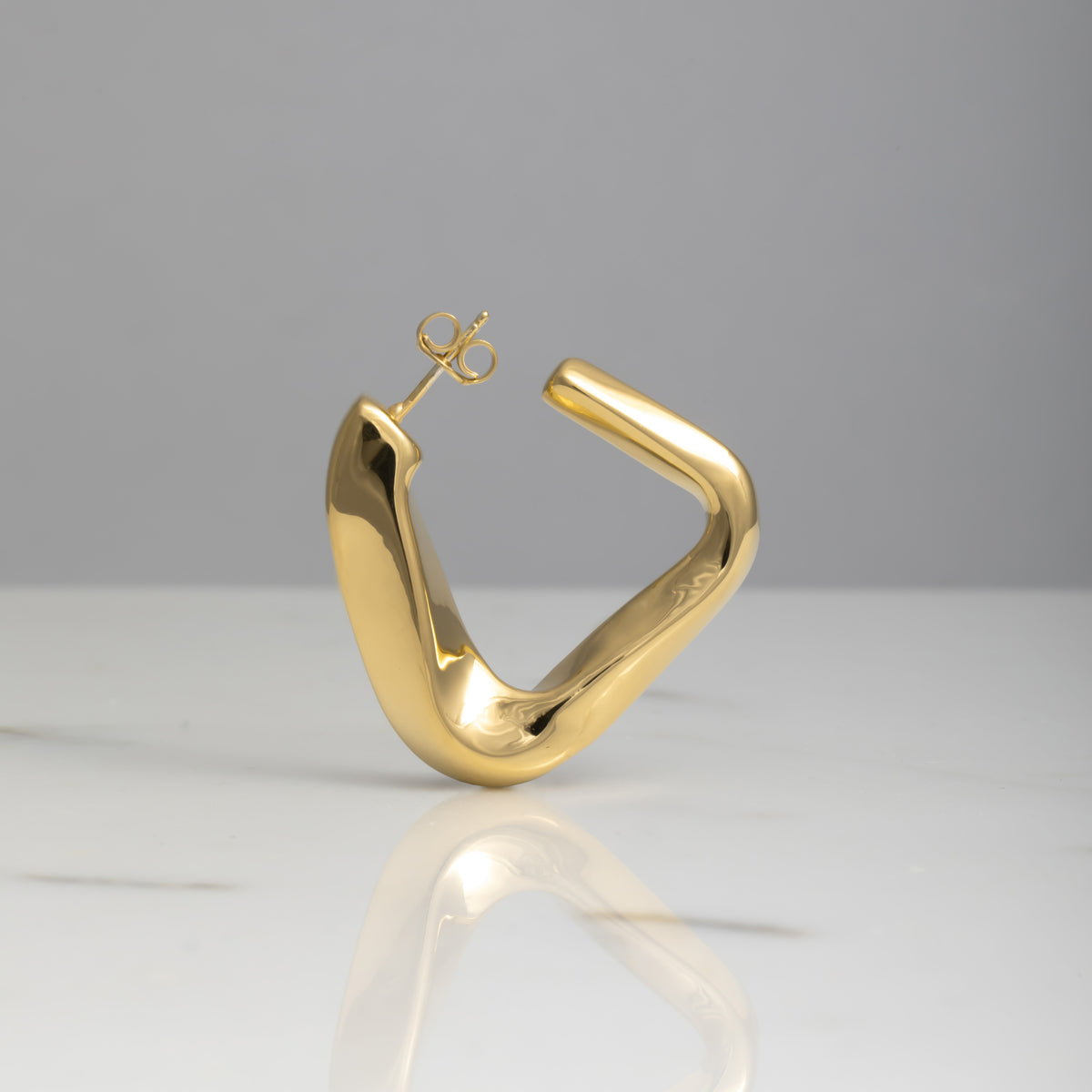 Orecchini Deng oro 18kt placcato